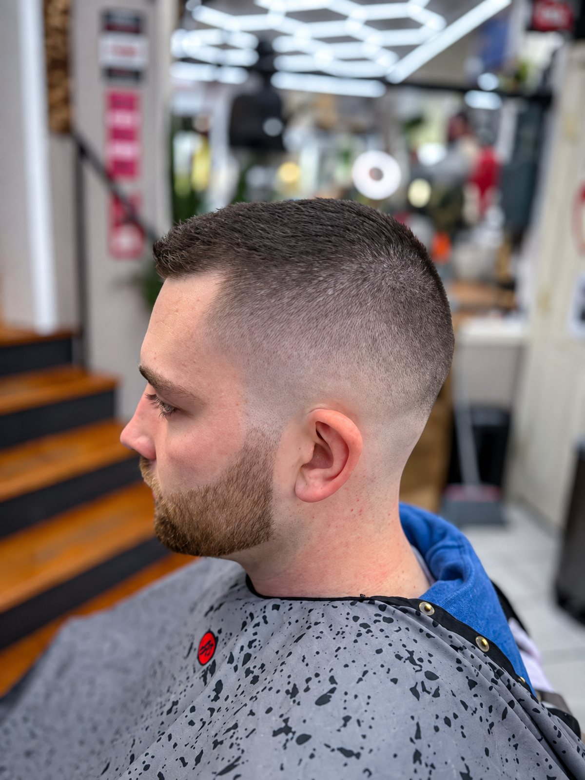 Clean skin fade with a tapered beard