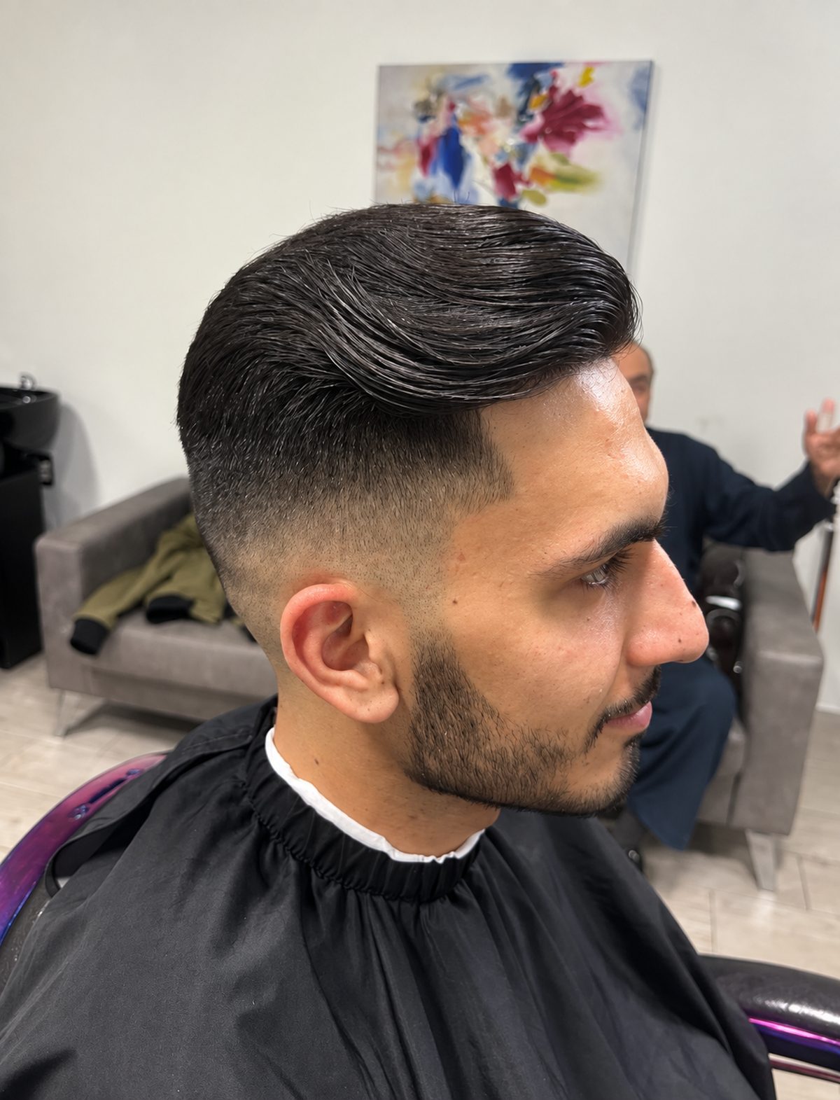 Slick back with a mid fade