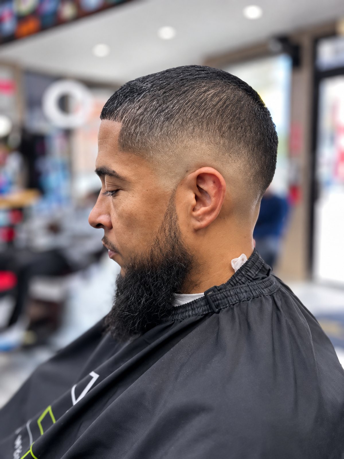 Sharp line-up with a full beard shape-up